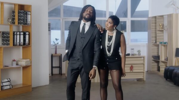 Johnny Drille and Tiwa Savage on set for the “Over The Moon” video