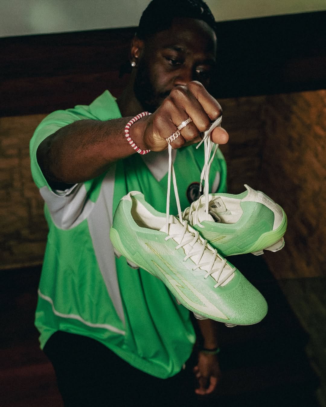 Ola Aina unveils eco-friendly boot