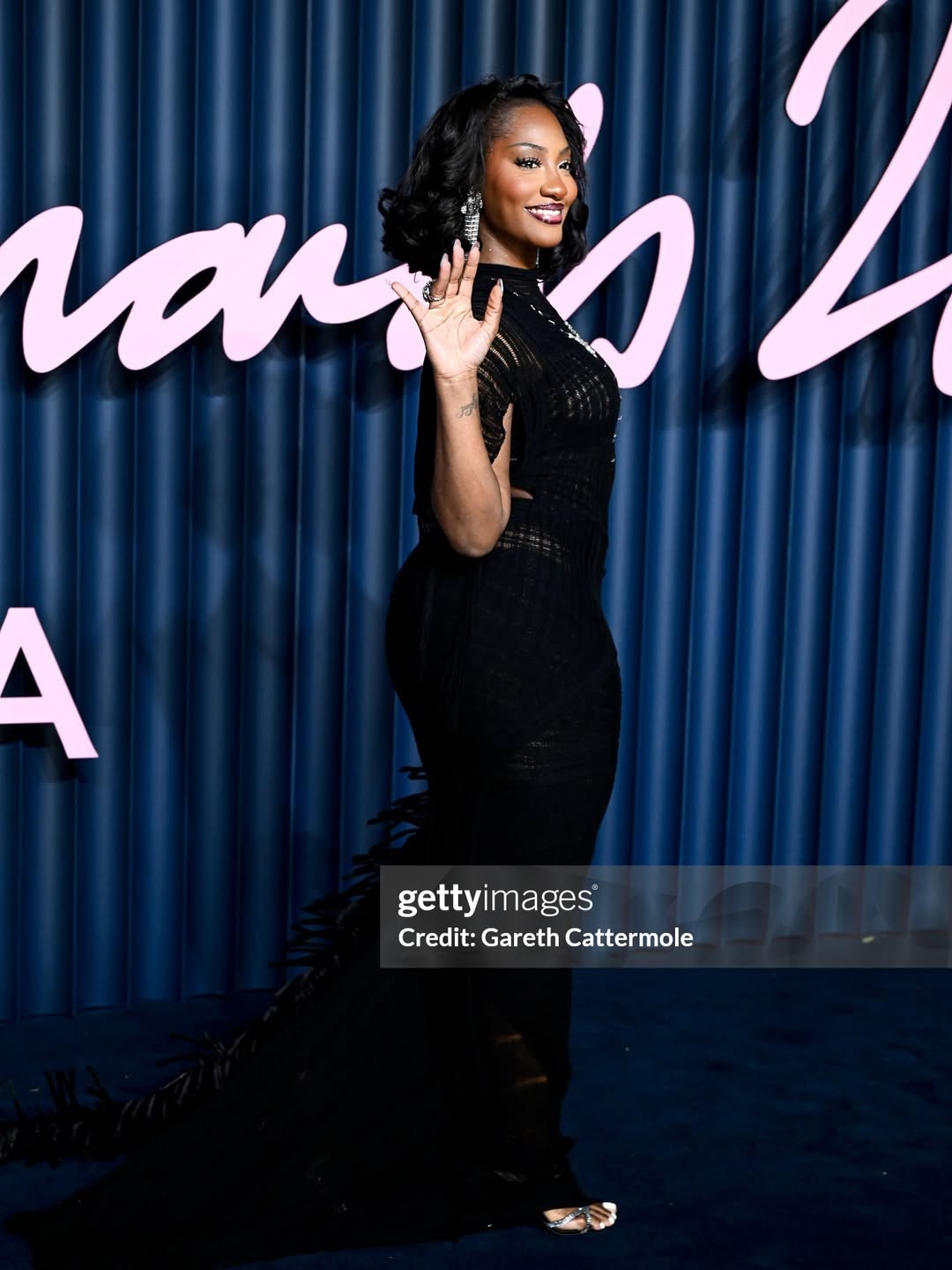 Tems wears a custom design by Givenchy at the 2025 Fashion Awards