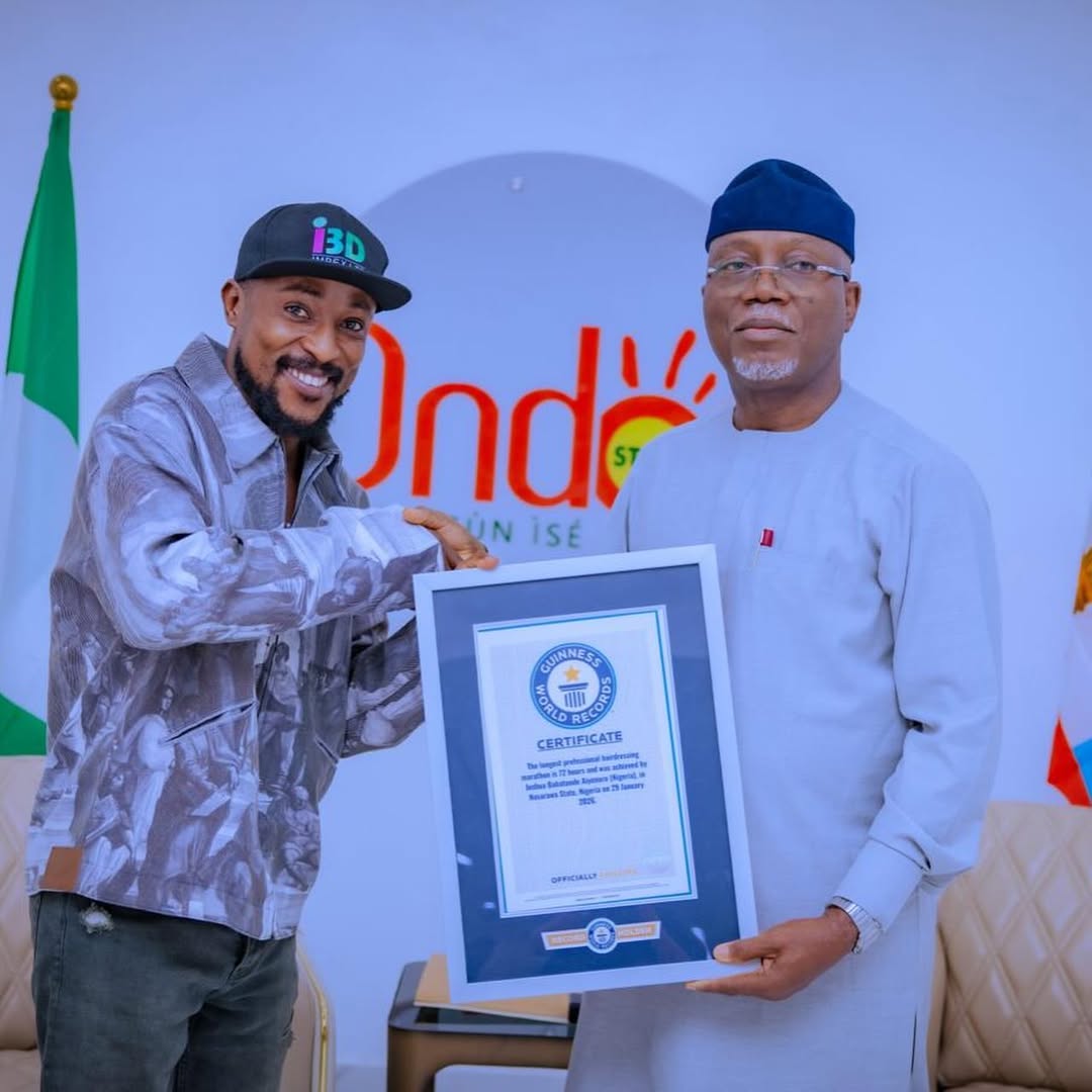Guinness World Record holder Aiyenuro presents certificate to Ondo Governor