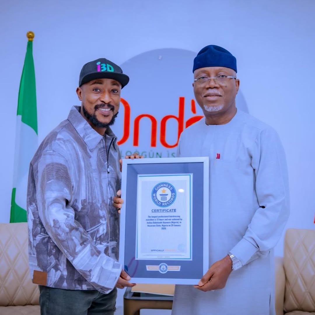 Guinness World Record holder Aiyenuro presents certificate to Ondo Governor