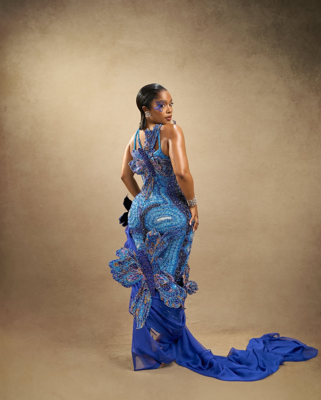 1,828 butterflies – how Nomzamo Mbatha wore Nigeria’s natural heritage on the AMVCA 2026 red carpet in Lagos State.