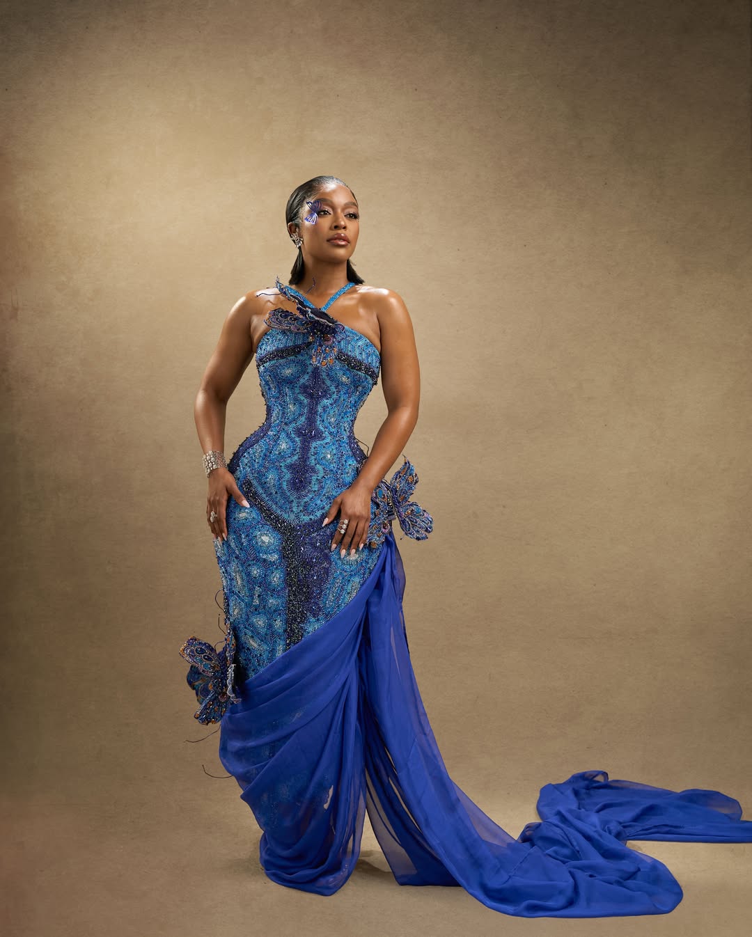 1,828 butterflies – how Nomzamo Mbatha wore Nigeria’s natural heritage on the AMVCA 2026 red carpet in Lagos State.