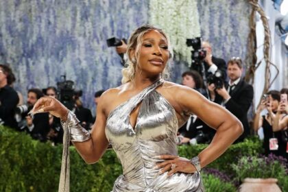 Serena Williams gleams in a metallic Marc Jacobs mini dress.Mike Coppola / Getty Images